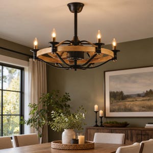 May include: A ceiling fan chandelier featuring a matte black metal frame with a circular light wood accent ring. The fixture includes five upward-facing candle-style light bulbs arranged around the central motor housing and fan blades.