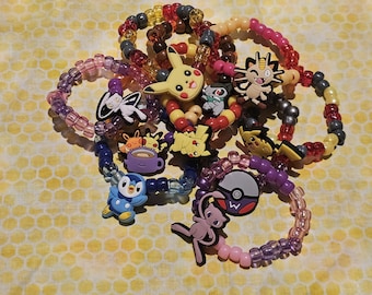 Pakiet tajemniczych bransoletek Kandi – motyw z anime Pocket Monster, niekończąca się zabawa!