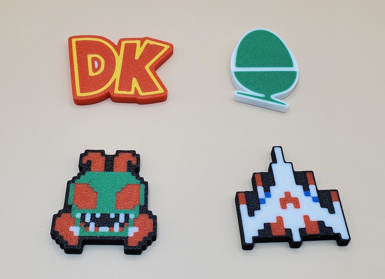 Magneti retrò (quantità da 6, qualsiasi combinazione) Pacman, Frogger, Centipede, Bubble Bobble, Link, Q-bert, Tux, Galaga, Minecraft, Mario, Xbox e molti altri! immagine 5