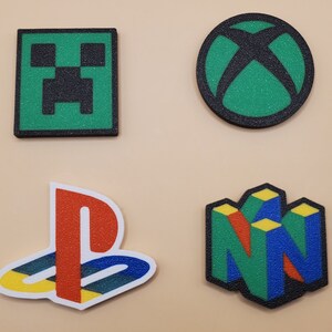 Magneti retrò (quantità da 6, qualsiasi combinazione) Pacman, Frogger, Centipede, Bubble Bobble, Link, Q-bert, Tux, Galaga, Minecraft, Mario, Xbox e molti altri! immagine 6