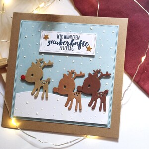 handgemachte Weihnachtskarte mit Rudolph und Freunden | 3D Rentiere mit 3D Schneeflocken, goldenen Sternen und Weihnachtsgruß