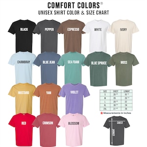 a collection of various t-shirt colors and sizes, including black, pepper, white, ivory, blue jeans, sea foam, blue sprudge, moss, mustard, yam, violet, and red. The image also includes a chart with measurements for each color and size, providing a visual guide for selecting the appropriate t-shirt based on one's size and preference.