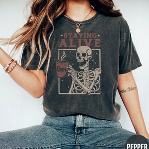 Staying Alive Shirt, Trendy Coffee Shirt, Funny Skeleton T-Shirt, Coffee Lovers Gift Skull Vintage Halloween Tshirt Women Comfort Colors Tee