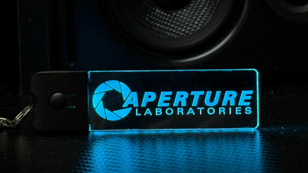 Aperture Laboratories LED Keychain - Color Changing - Futuristic LED ...