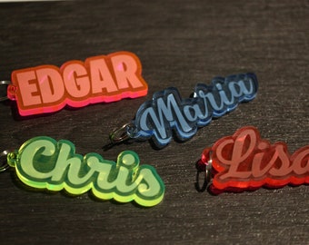Custom designed, laser cut, acrylic keychain / zipper pull personalized with your name, favorite word, or hashtag