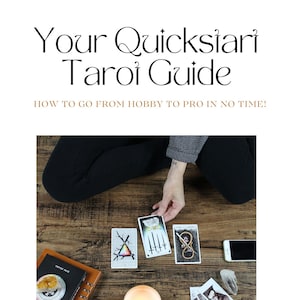 May include: A person is sitting on a wooden floor with a lit candle, a book, and tarot cards spread out in front of them. The cards are the Three of Swords, the Four of Swords, and the Eight of Swords. The book is titled "The Guide".