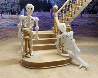 1:24 (half scale) skeletons! poseable. comes in white or glow in the dark green. perfect for a halloween dollhouse or diorama.