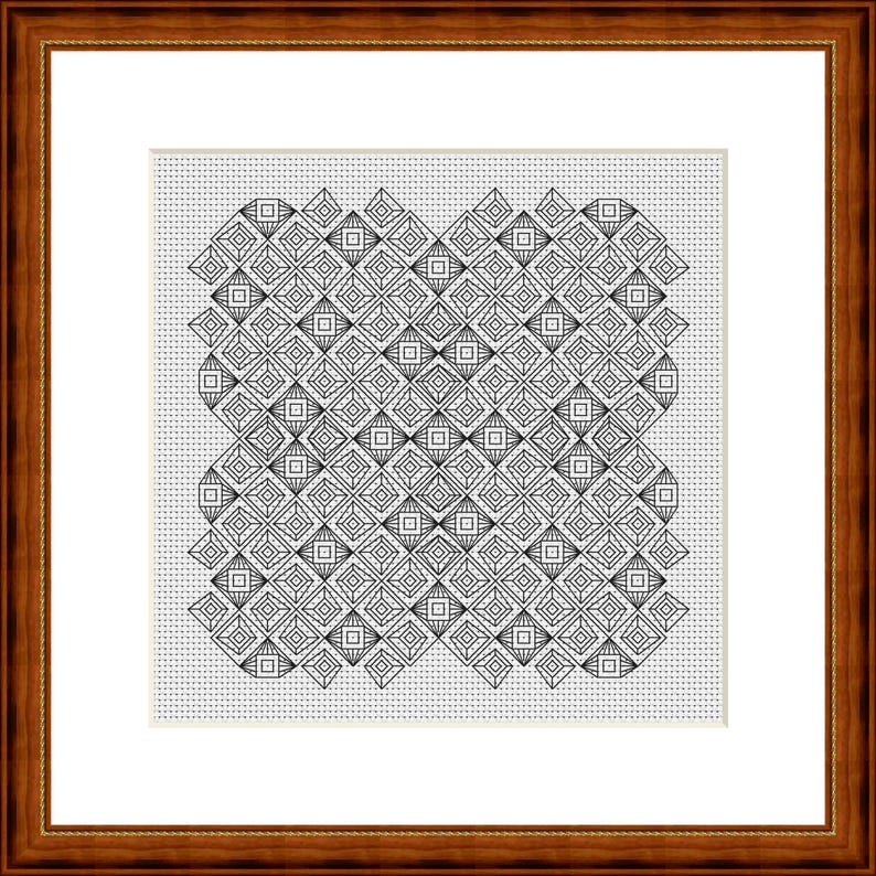 May include: A framed cross-stitch pattern with a repeating geometric design in black thread on a white background. The pattern features diamond and square shapes. The frame is dark brown wood.