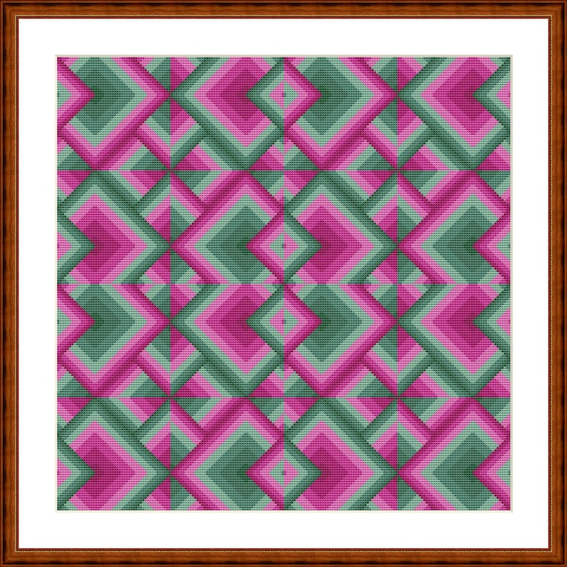 May include: A framed artwork featuring a geometric pattern. The design consists of layered diamond shapes in shades of pink, green, and gray. The artwork is encased in a brown wooden frame with a white mat.