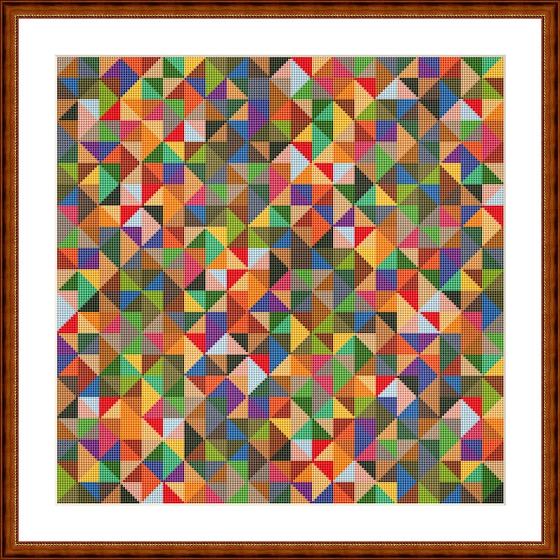 May include: A framed artwork with a vibrant geometric design. The pattern is made up of many small triangles and squares in various colours, such as red, orange, green, blue, and purple. The frame is a dark brown colour.