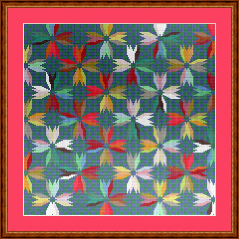 May include: A square cross-stitch embroidery pattern featuring a repeating floral motif in shades of red, yellow, white, and green against a dark blue background. The artwork is enclosed within a bright pink border and a dark brown wooden frame.