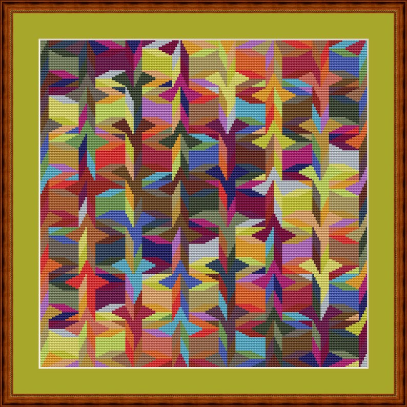 K&ouml;nnte beinhalten: Ein gerahmtes Kreuzstich-Kunstwerk mit einem lebendigen, abstrakten Design. Das Muster besteht aus sich wiederholenden, stilisierten Formen in einer Vielzahl von Farben, darunter Rot, Blau, Gelb und Gr&uuml;n. Das Kunstwerk ist in einem gr&uuml;nen Passepartout und einem braunen Holzrahmen gefasst.
