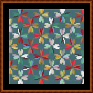 May include: A square cross-stitch embroidery featuring a repeating floral pattern of four-petaled blossoms in red, yellow, white, and green, set against a dark teal grid background, enclosed within a black mat and a polished brown wooden frame.