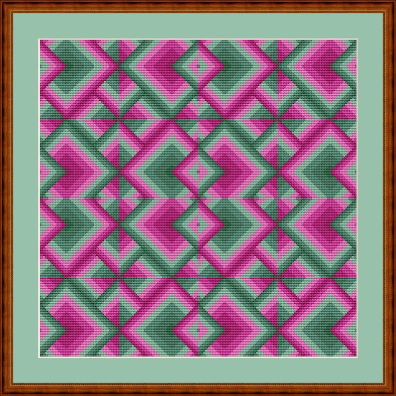 May include: A framed artwork featuring a geometric pattern of layered diamonds in shades of pink, green, and gray. The artwork is set against a light green background and framed in a brown wooden frame.