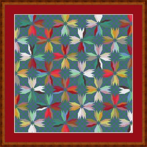 May include: A cross-stitch pattern featuring a repeating grid of multi-coloured floral shapes on a dark teal background. The design consists of symmetrical petals in shades of red, yellow, white, and green, enclosed within a deep red border and a wooden frame.