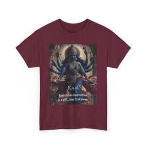 May include: A maroon t-shirt with a graphic of Kali, a Hindu goddess, with the text "KALI Sometimes destruction is a gift...tear it all down."