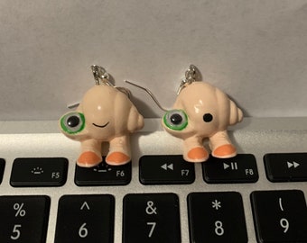 3D printed Marcel the Shell With Shoes On earrings