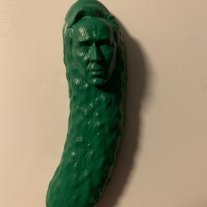 3D printed Pickolas Cage magnet.
