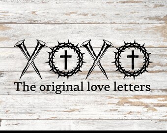 May include: Black and white graphic design of two nails crossed over each other with a crown of thorns and a cross in the center on either side of the nails. The text "The original love letters" is below the graphic.