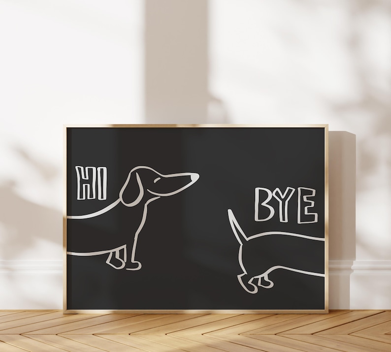 May include: Black and white illustration of two dachshunds on a black background with a gold frame. The dachshund on the left says "HI" and the dachshund on the right says "BYE".