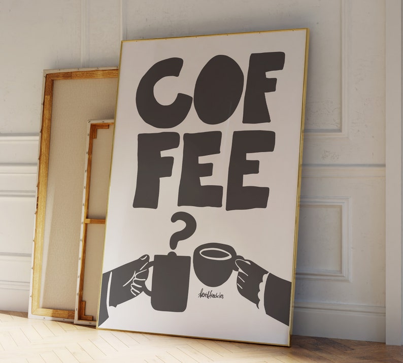 May include: A white poster with black text that reads "COFFEE?" with two cartoon hands holding coffee cups. The text "dontfreak.is" is written below the cups.