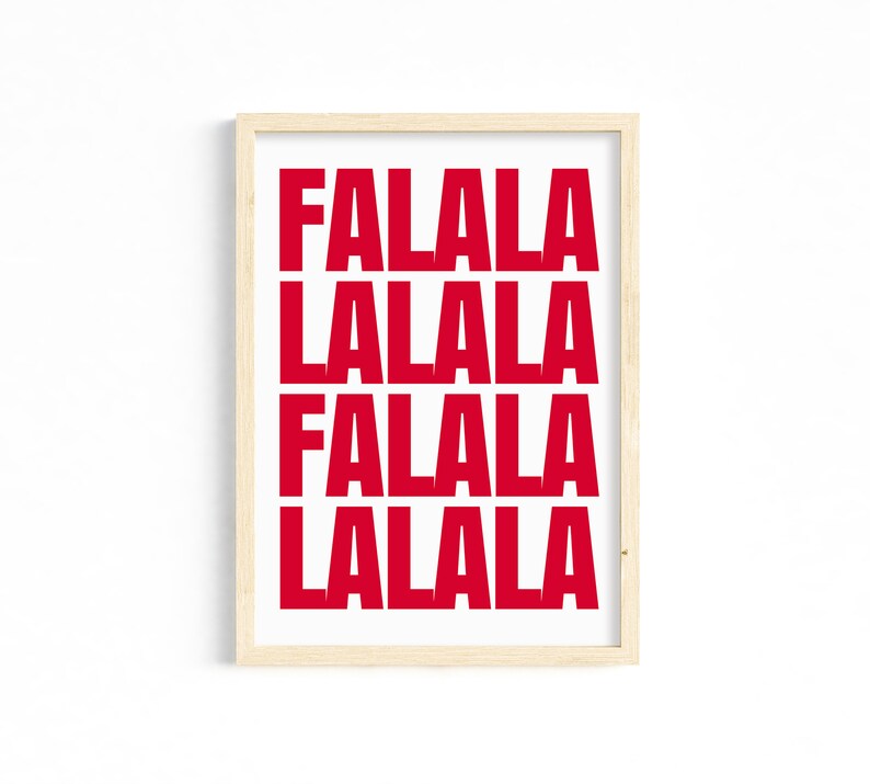 May include: A framed print with the words "FALALA LALALA FALALA LALALA" in bold red letters on a white background. The print is in a light wood frame, suitable for holiday decor.