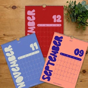 Modern väggkalender 2027 | Färgglad grafisk månadsplanerare (A4, A3)