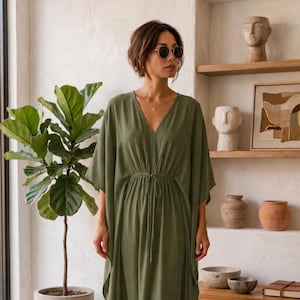 olive green loose dress Fawuudo Women's Boho Dress High Neck Sleeveless Lace Trim Loose Fit Shift Casual Mini Dress Olive Green, Size: Small