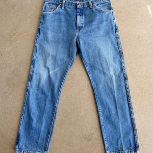 Jeans Wrangler 47MWZ vintage anni 2000, gamba dritta, taglia 35, taglio cowboy, effetto sbiadito e usurato, stile western immagine 1