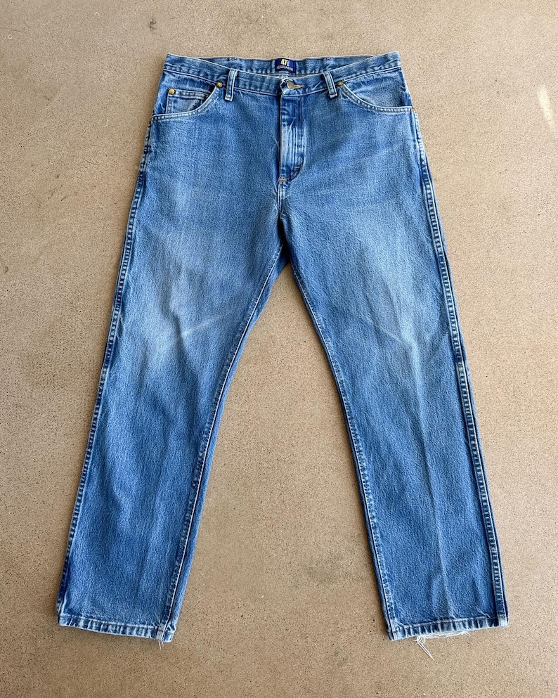 Jeans Wrangler 47MWZ vintage anni 2000, gamba dritta, taglia 35, taglio cowboy, effetto sbiadito e usurato, stile western immagine 1
