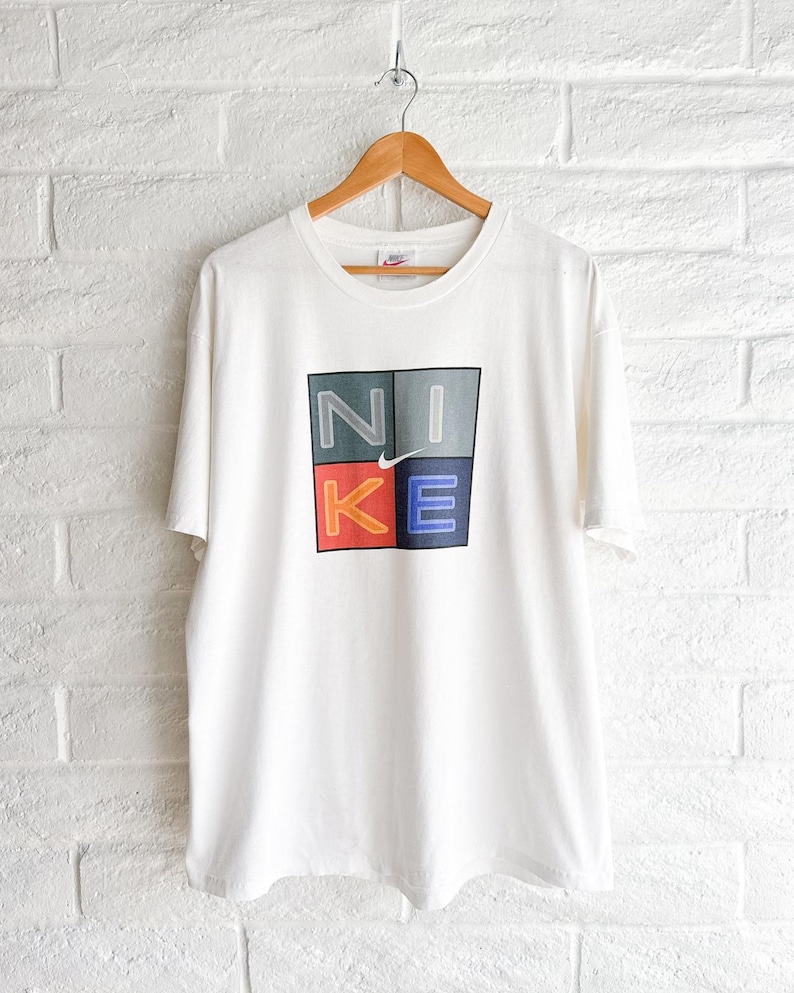 Camiseta Nike Center Swoosh vintage de los años 90 para hombre, talla L, costura simple, fabricada en EE. UU. imagen 1