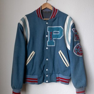Chaqueta universitaria de cuero y lana con la letra "P" de los años 80, con parches de campeones de fútbol, talla grande para hombre, fabricada en EE. UU.