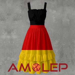May include: A dress featuring the colours of the German flag: black bodice, red skirt, and yellow ruffled hem. The dress has a sleeveless design with straps. The word "AMOLEP" is printed at the bottom of the dress.
