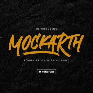 May include: Introducing Mockarth, a rough brush display font by Kongfont. The font is written in a bold, yellow, brush-stroke style against a black background.