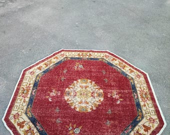 Handmade Warm Pink Wool Rug: Turkish Oval Carpet (6'3" x 6'3")