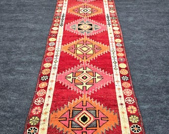 Vintage Turkish Runner Rug: Handwoven Wool, Red Geometric Design