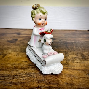 Vintage Porcelain Holiday Angel Child on Sled with Lamb Figurine Made in Japan