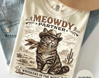 Funny Meowdy Partner Cat Shirt Cowboy Cat Tee Western Cat Lover Gift  Vintage Country Cat Shirt Cat Mom Graphic Whiskers In The Wind Shirt