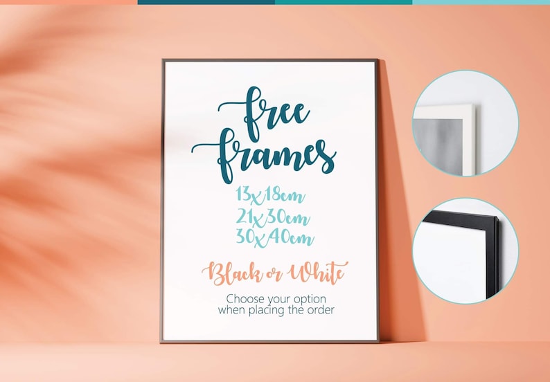 May include: A white poster with the text "free frames" in blue cursive lettering. The poster lists three frame sizes in centimeters: 13x18cm, 21x30cm, and 30x40cm. The poster also states "Black or White" and "Choose your option when placing the order". The poster is framed in a black frame and is displayed on a peach-colored surface.