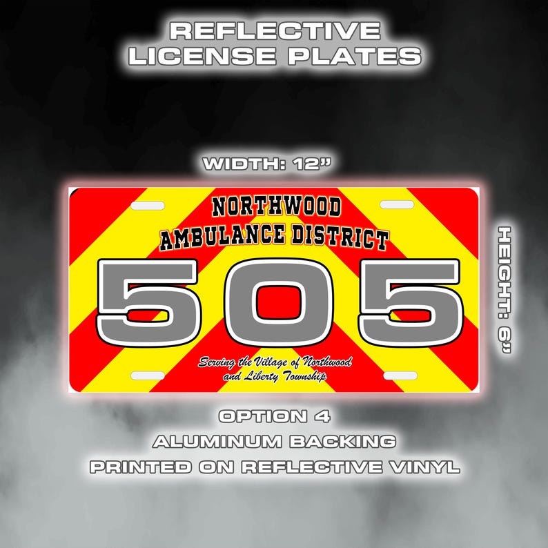 May include: A rectangular reflective license plate with a red and yellow chevron pattern. The plate reads "NORTHWOOD AMBULANCE DISTRICT" and "505". It measures 30.48 cm wide and 15.24 cm high.