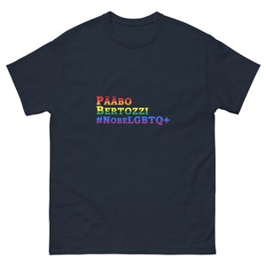 May include: Navy blue t-shirt with the text "Pääbo Bertozzi #NobelLGBTQ+" in rainbow colors.