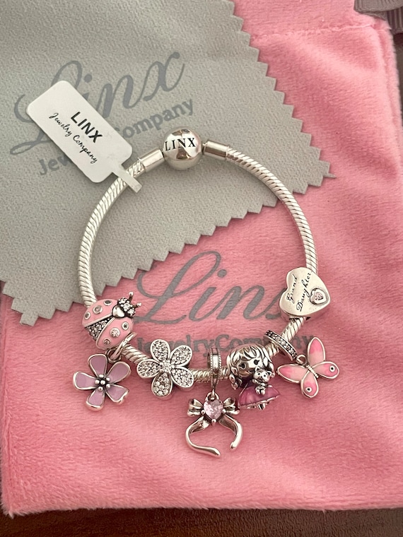 m.a+ thin silver cross studded wrist band / A-F2BL1/GR2,0