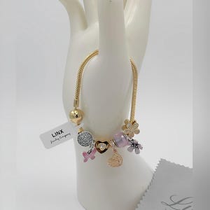 Linx Yellow Gold Snake Chain Bracelet with Pink Mom Themed Charms