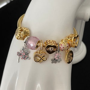 Linx Yellow Gold Snake Chain Bracelet with Pink Mom Themed Charms