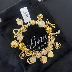 Linx Yellow Gold Snake Chain Bracelet with Gold Charms
