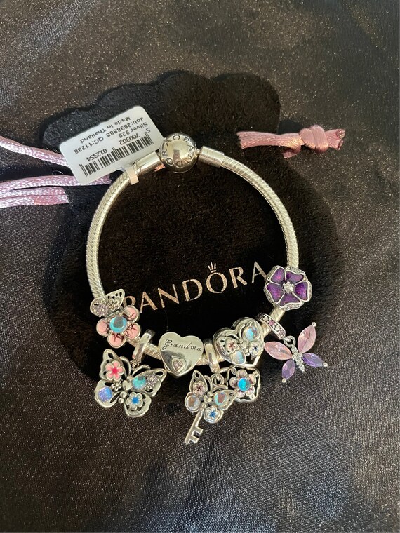 Pandora Sterling Silver 7 inch plus 1 inch extender charm bracelet