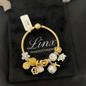 Linx Yellow Gold Snake Chain Bracelet with Silver and Yellow Gold Religious Mom Themed Charms