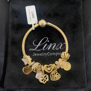 Linx Yellow Gold Snake Chain Bracelet with Gold Charms