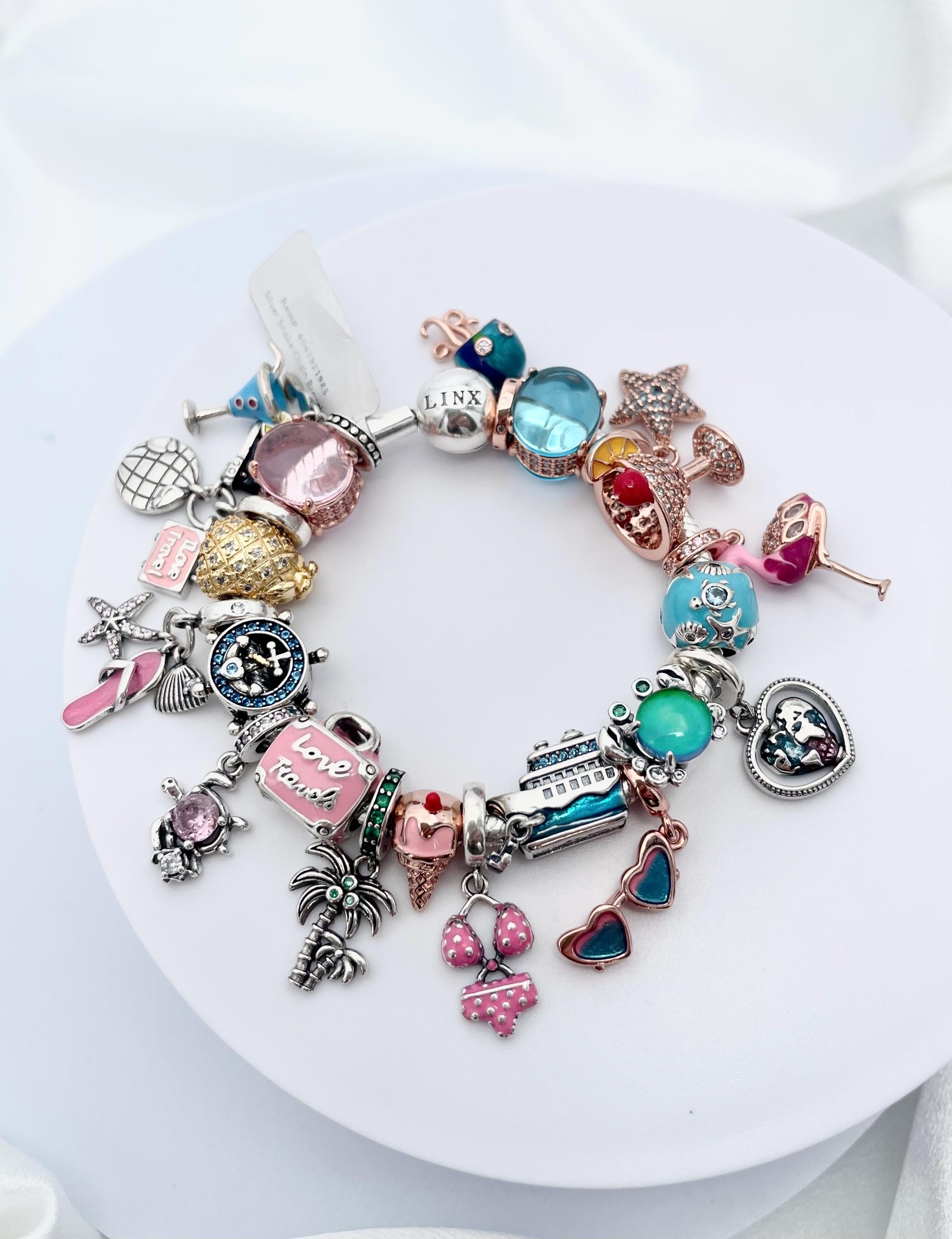 Linx Silver Snake Chain Bracelet With Travel and Vacation Themed