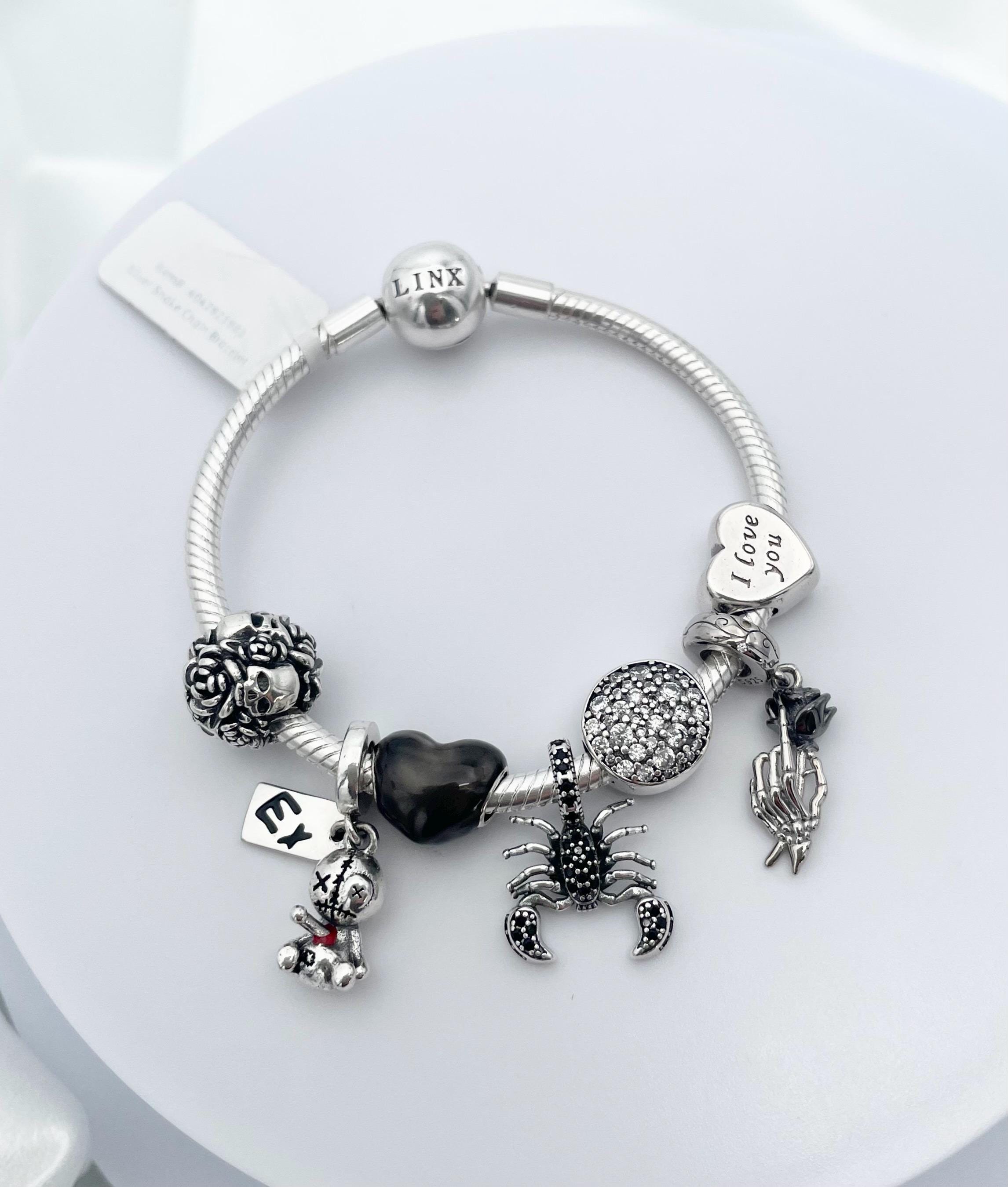Linx Sterling Silver Charm Bracelet: Skull, Rose, Scorpion Charms
